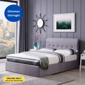 Studio image of a grey bed frame at an angle dressed in bedding