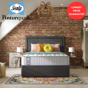 Studio image of the Sealy Emin mattress on a bed