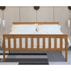 Marnel oak bed frame pictured face on with mattress, bedding and pillows