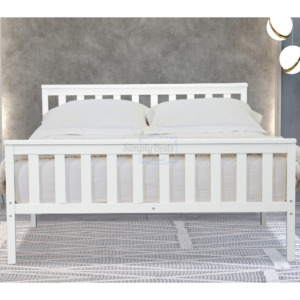 Marnel white wooden bed frame pictured face on with mattress, bedding and pillows