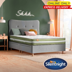 Lifestyle image of the Just Breathe mattress on a bed with online only and express delivery signs