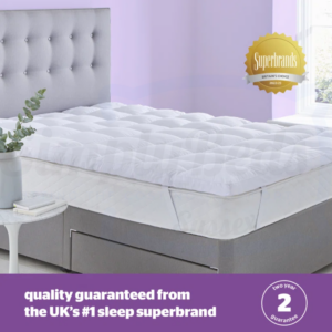 Studio image showing the topper on a bed with super brand guarantee
