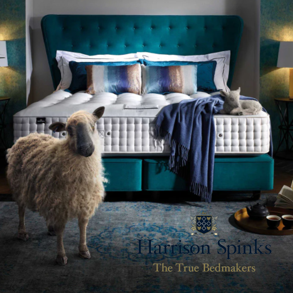 Harrison Spinks bed with mattress and a sheep standing next to it