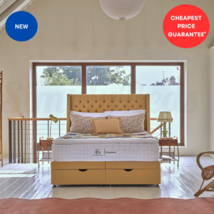 Studio image of the Sleepeezee wool luxe 3700 mattress semi dressed on a divan bed