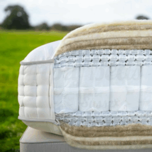 A cut out showing the layers of filling inside a Harrison Spinks Sapphire mattress