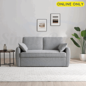 Lifestyle image taken front on, of the Kyoto Clarke sofa bed in grey fabric