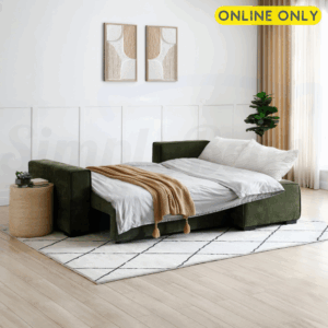 Lifestyle image of the Harrison Corner Sofa Bed in olive chenille fabric - set in sleeping position and dressed