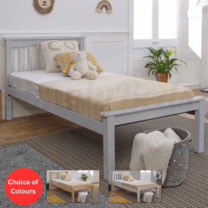 Lifestyle image of a grey wooden bed frame with low foot end and a semi dressed mattress