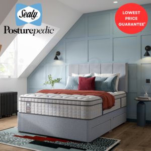 Studio image taken at an angle of the Sealy Blake mattress on a bed